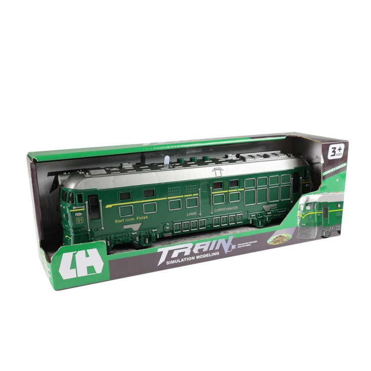 alt="model lokomotywy z projektorem"